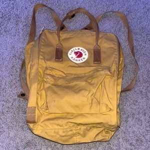 kånken backpack in color Warm Yellow